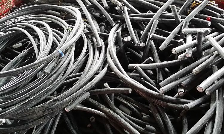 Pile of unused aluminium cable to undergo non-ferrous metal recycling